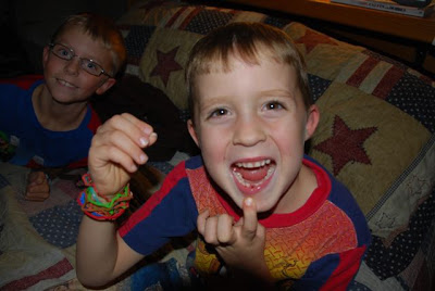 You are currently viewing Adam lost his FIRST TOOTH tonight!!