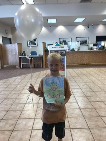 Read more about the article Luke WON the coloring contest at the Bank